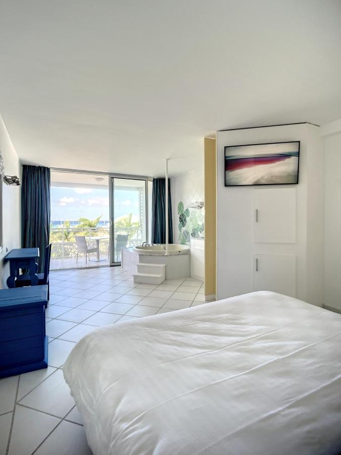 Le Domaine Anse Marcel Beach Resort Exterior foto