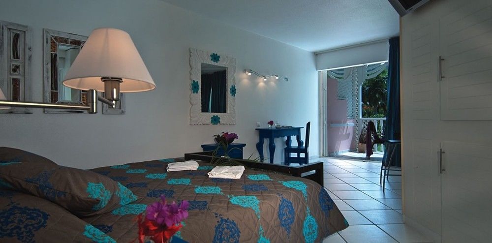 Le Domaine Anse Marcel Beach Resort Exterior foto